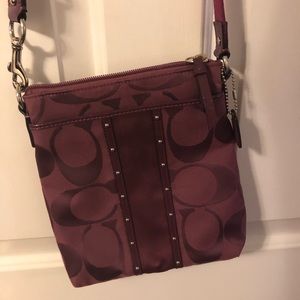 Burgundy Coach crossbody purse
